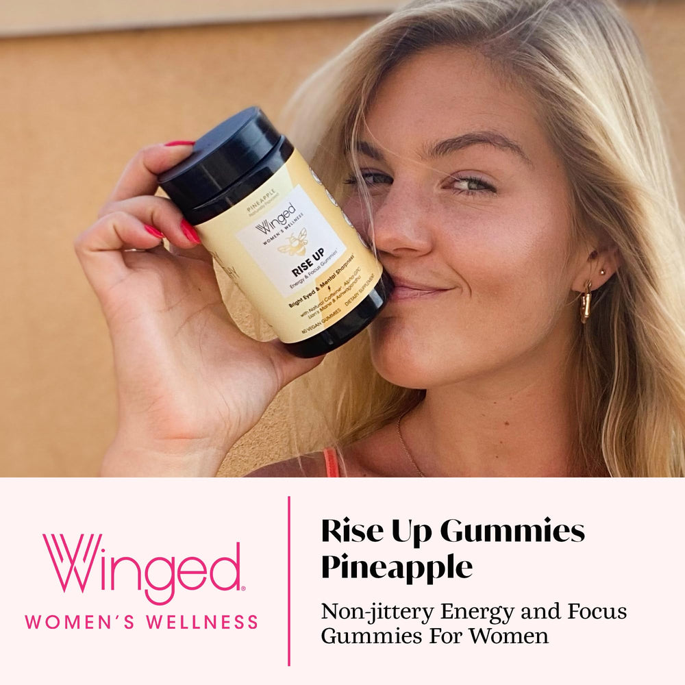 Closeup of Winged Wellness Rise Up gummies with caffeine and nootropics for alertness