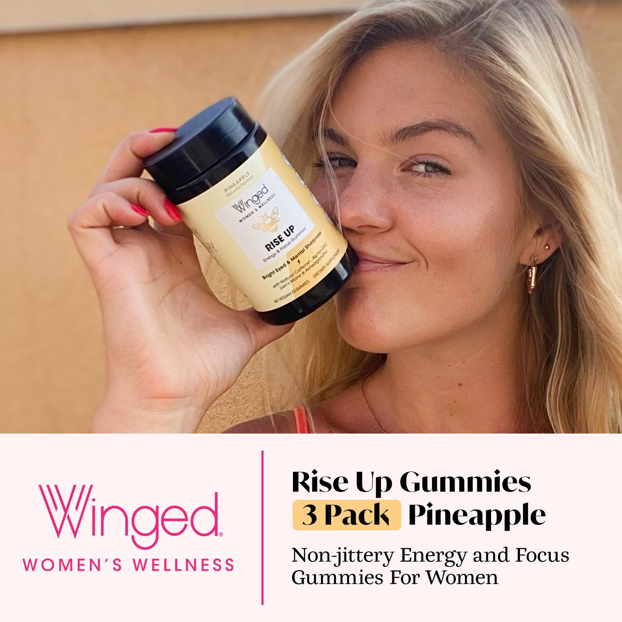 Winged Wellness Rise Up gummies close-up in pineapple color