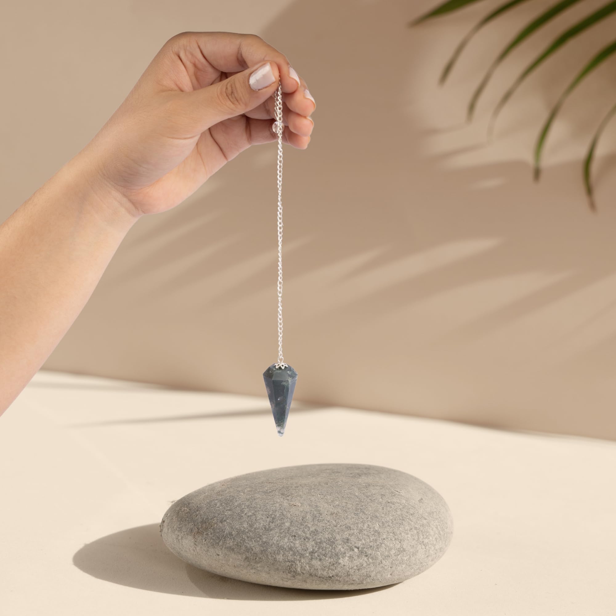 Wish Well bloodstone pendulum closeup featuring the crystal ball for intuitive readings.