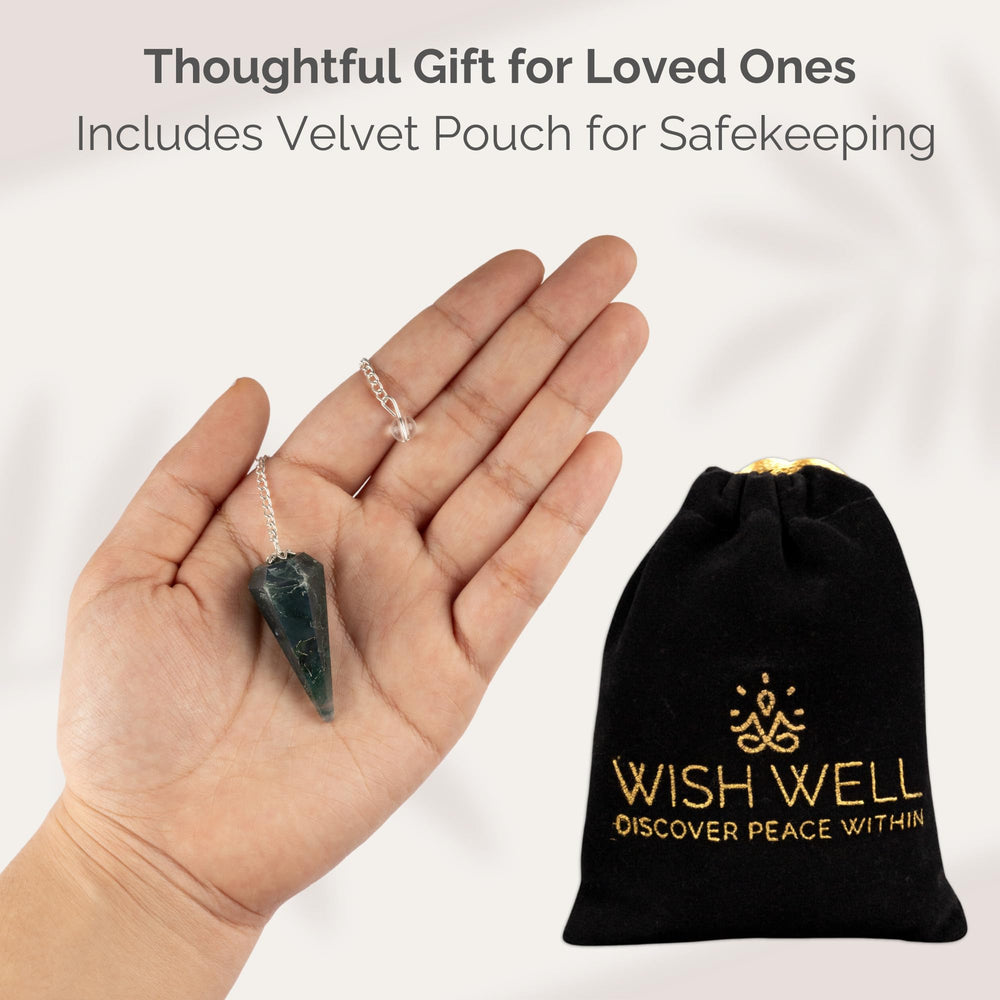 Wish Well bloodstone pendulum used during a crystal grid or meditation session.