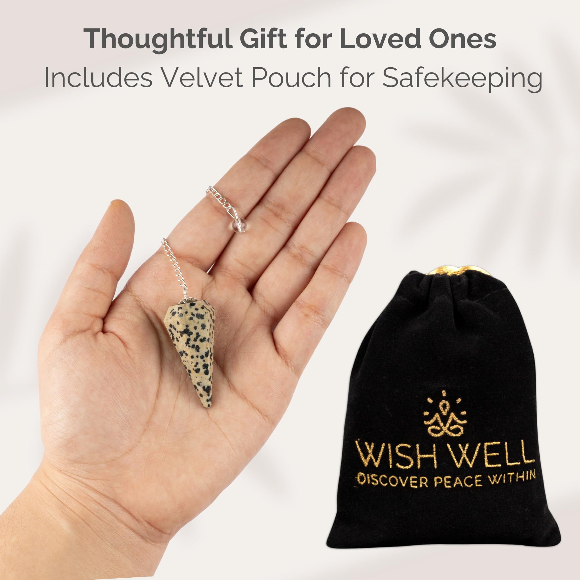 Wish Well pendulum during a chakra healing session focusing on Dalmatian Jasper energy.