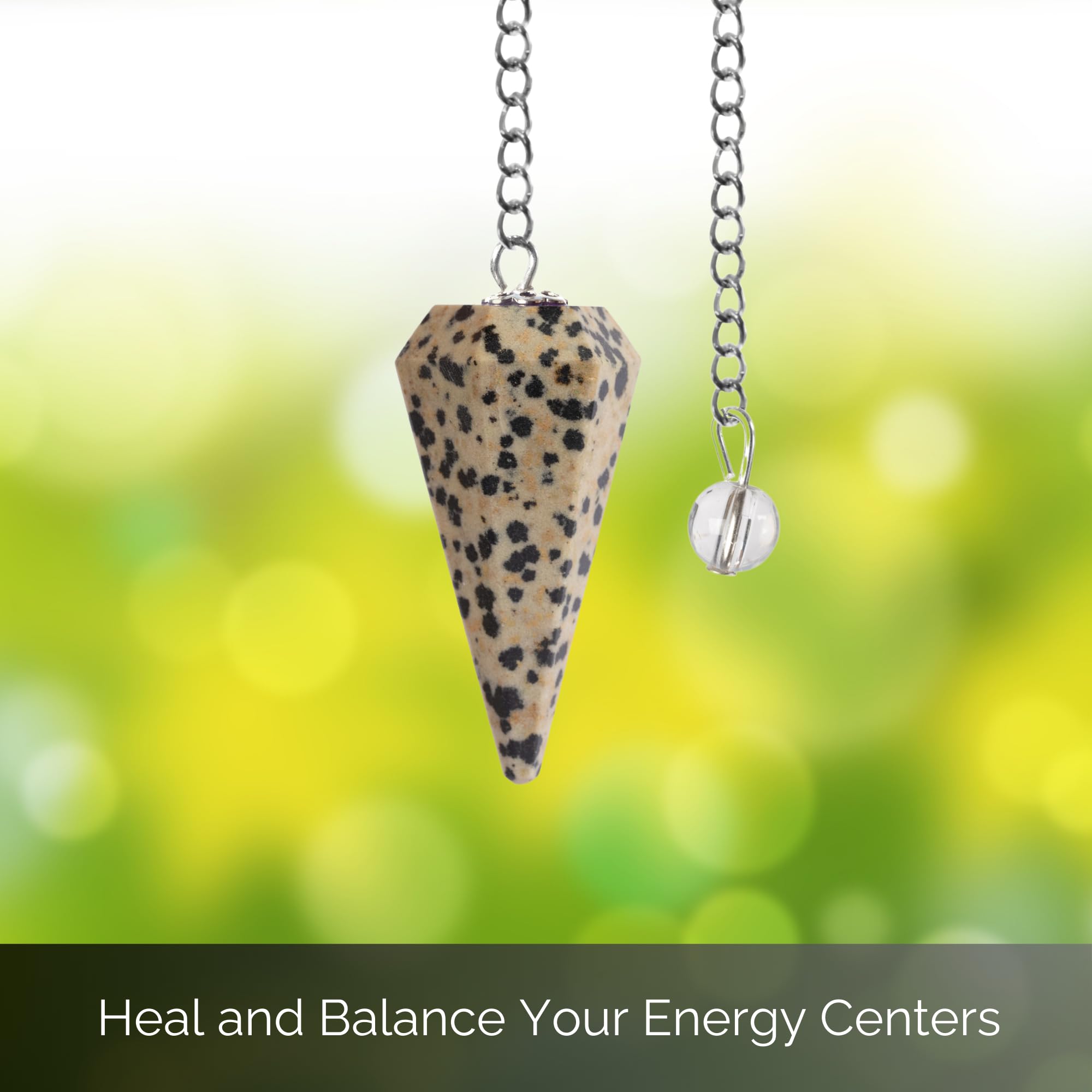 Wish Well Dalmatian Jasper pendulum resting on a crystal grid to support chakra balancing.