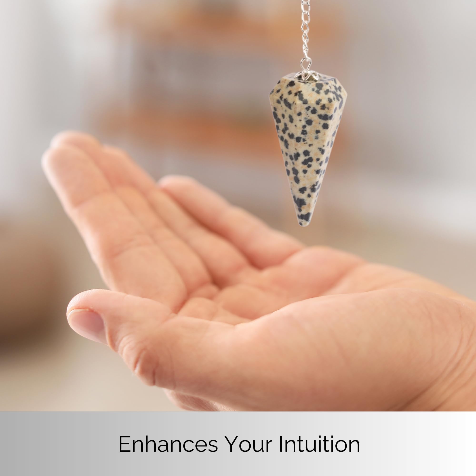 Wish Well velvet pouch beside a Dalmatian Jasper pendulum, ready for gifting and energy work.