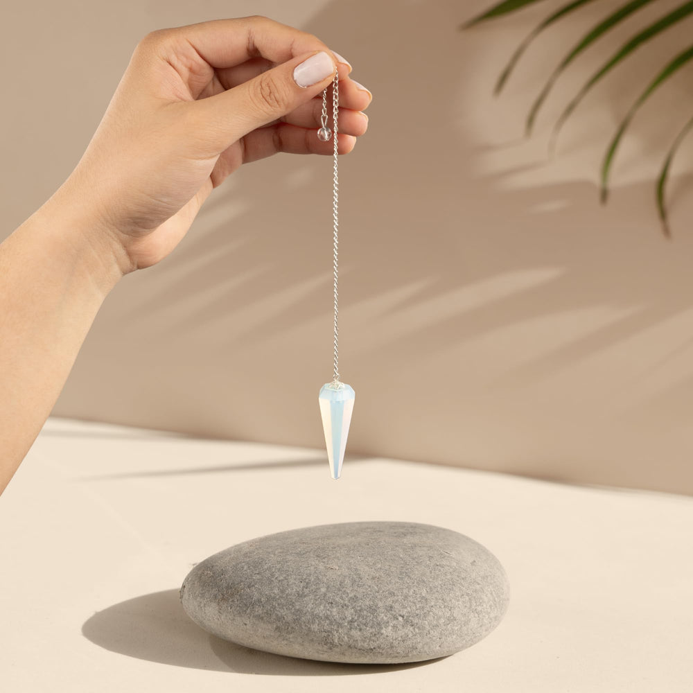Wish Well Opalite pendulum during meditation aids intuition and inner clarity.