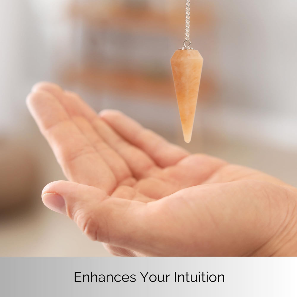 Wish Well peach aventurine pendulum in use during meditation or energy work.