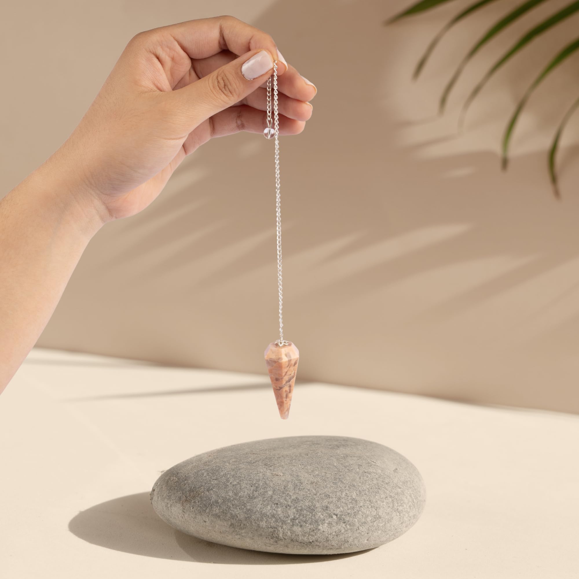 Wish Well Peach Moonstone crystal pendulum set aids divination sessions and chakra work.