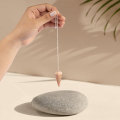 Wish Well Peach Moonstone crystal pendulum set aids divination sessions and chakra work.