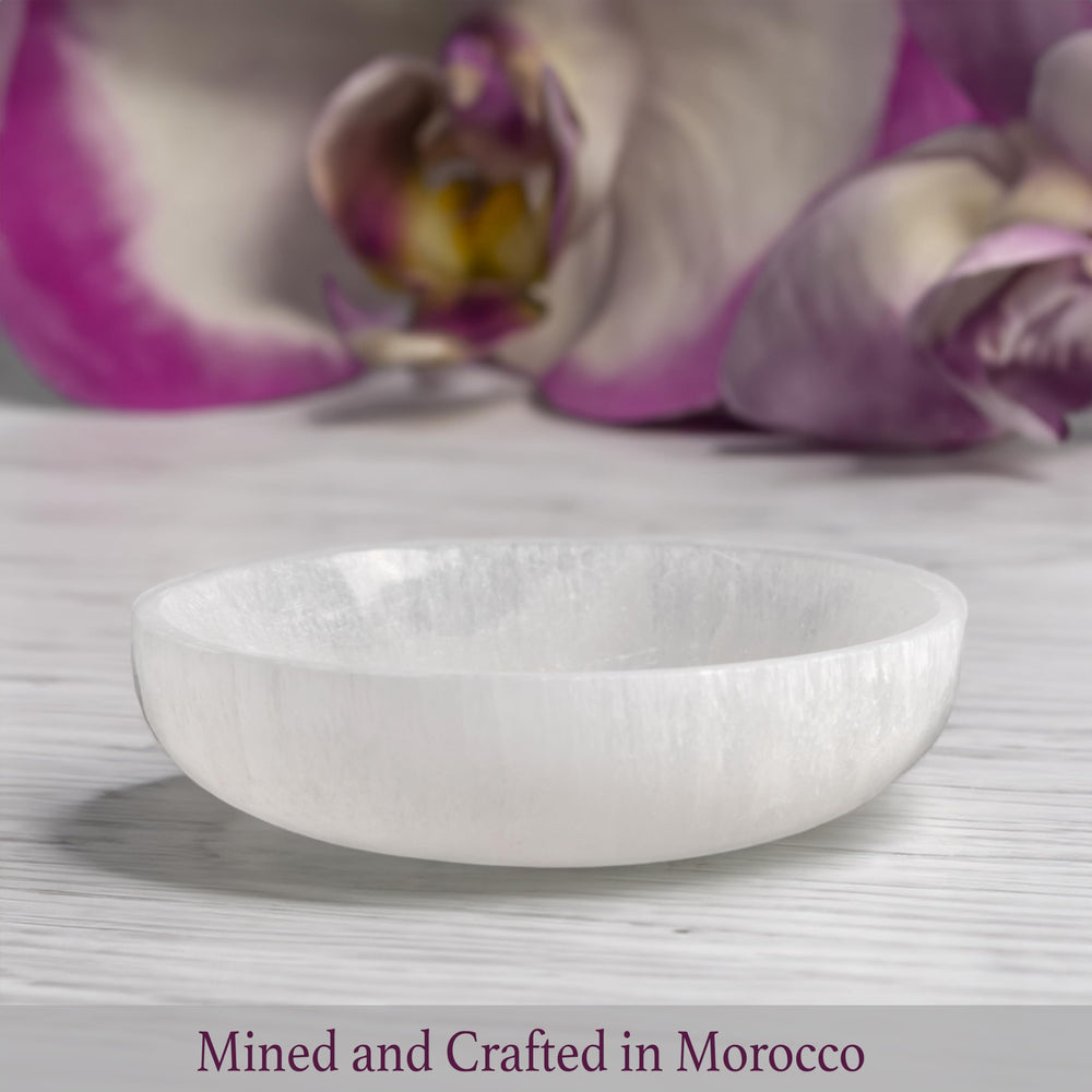 Wish Well selenite bowl keeps jewelry and stones neatly displayed.