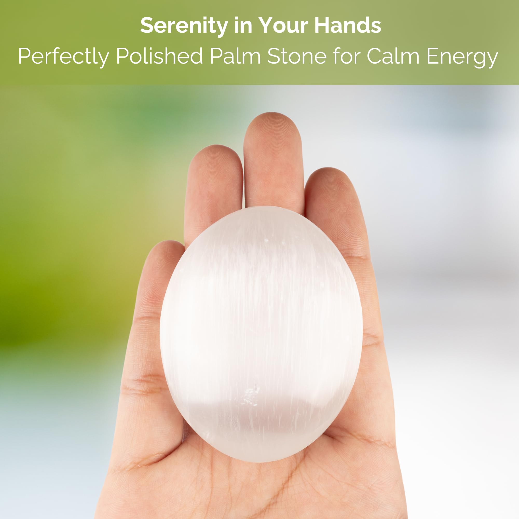 Wish Well selenite palm stone on desk creates a peaceful atmosphere.