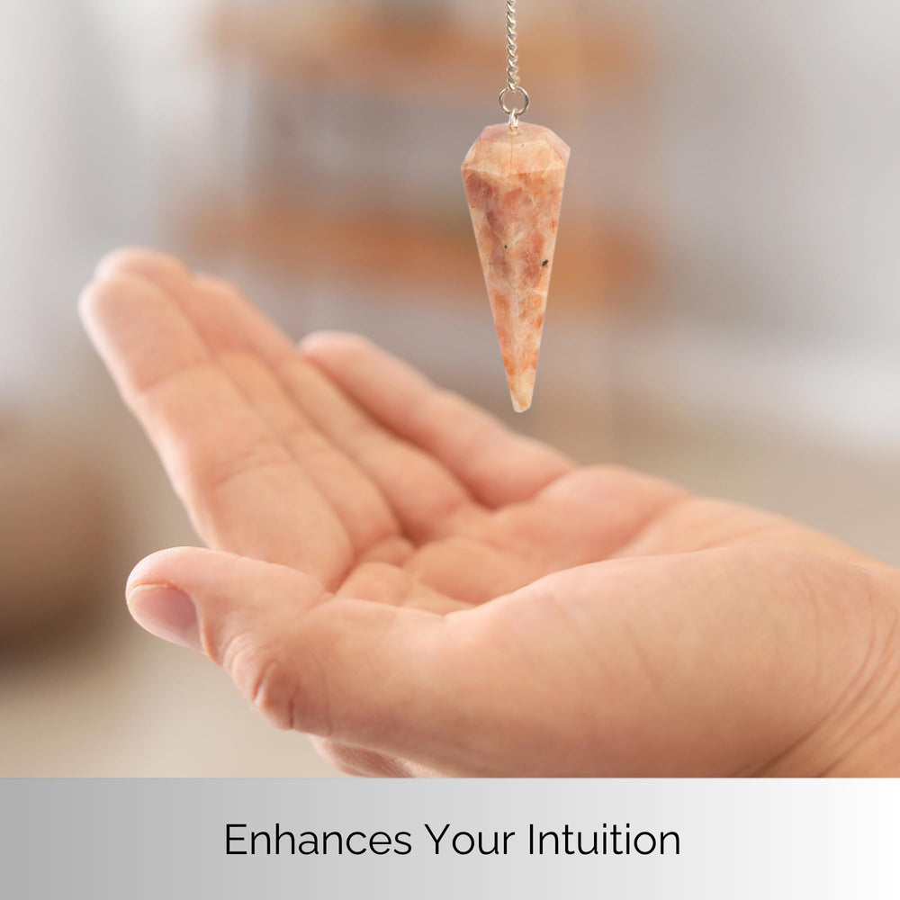 Wish Well Sunstone Pendulum seven inch chain visible for chakra balancing.