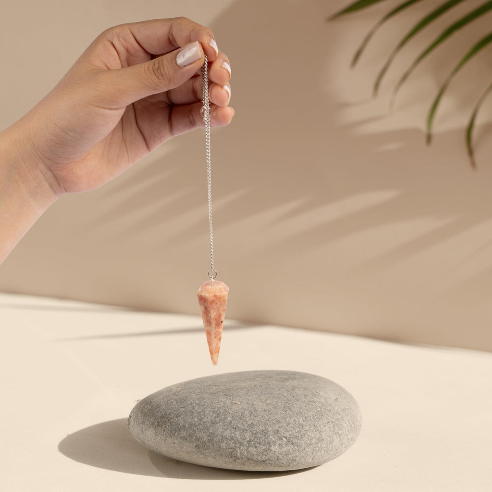 Wish Well Sunstone Pendulum sunstone crystal close up for clarity and insight.