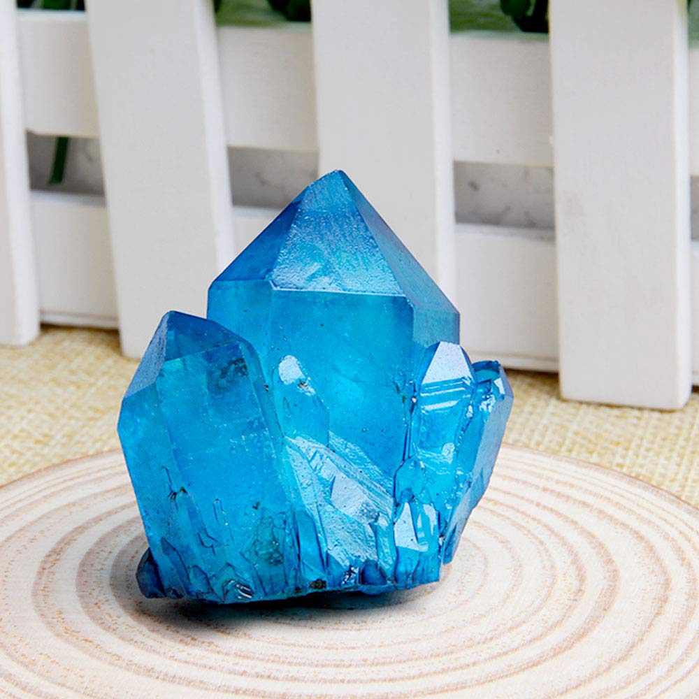 Wixine blue titanium quartz cluster paperweight adds subtle focal point.