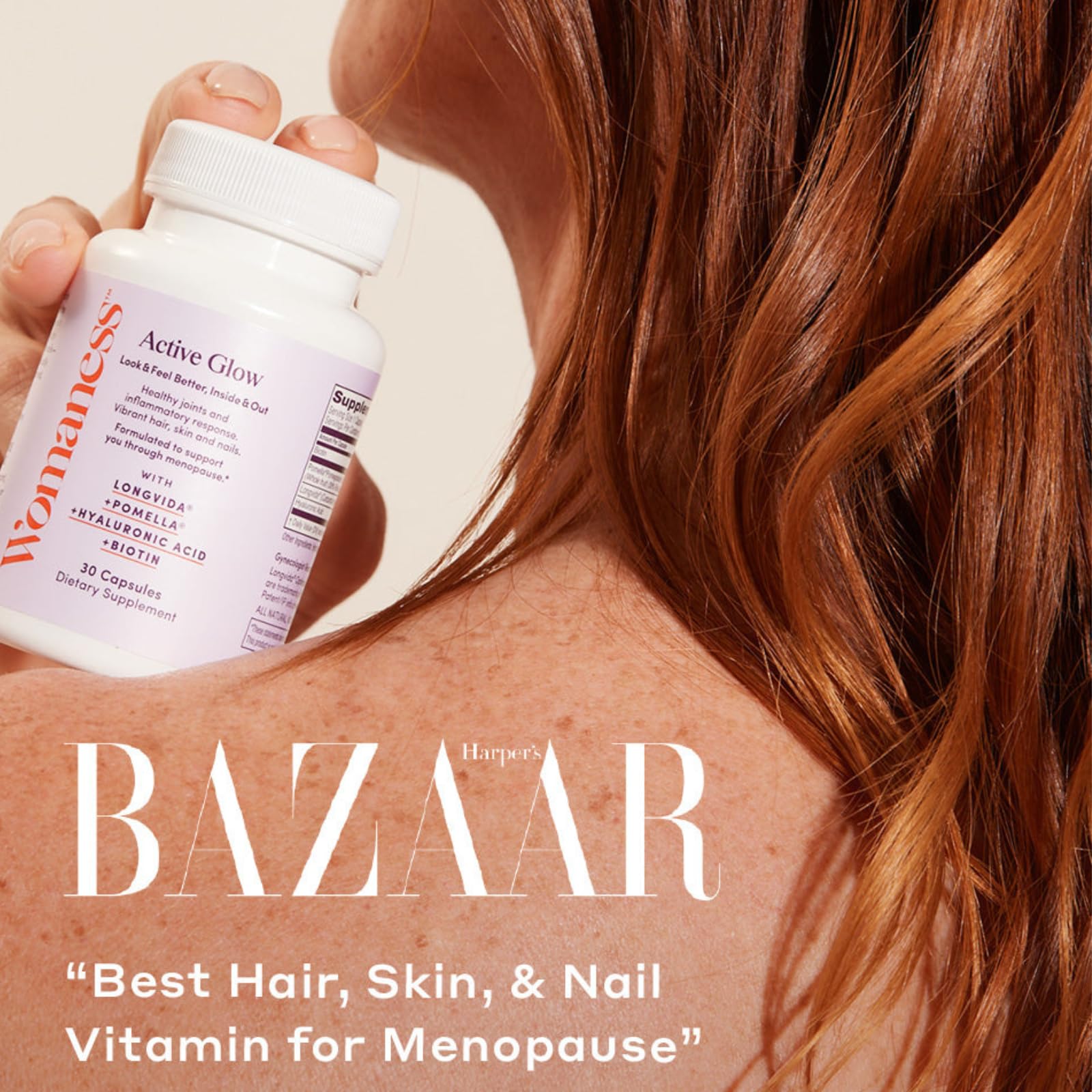 Womaness Active Glow biotin capsules closeup emphasizing nail and hair strength