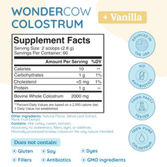 WonderCow Colostrum Powder vanilla scoop immersed in glass with vanilla aroma