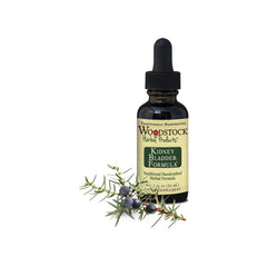 Woodstock Herbal Kidney Bladder Formula bottle pour highlights the tincture's rich amber color for daily wellness rituals.