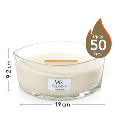 WoodWick Elipsa Vanilla Bean candle with a soy-wax blend visible in soft glow.