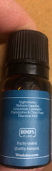 Woolzies Unwind Refresh bottle promoting grounding and focused calm during work.