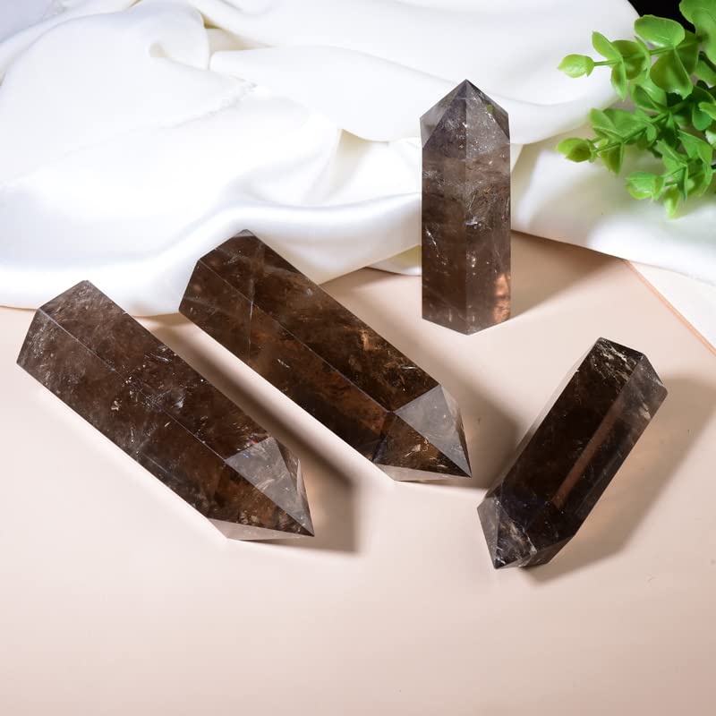 WUYOUSHI smoky quartz tower aids chakra balancing within a calm room