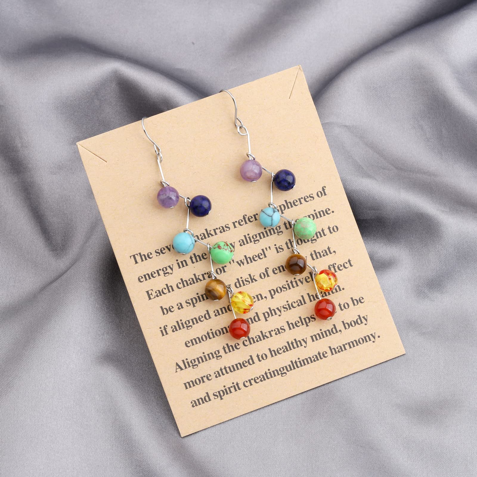 WUSUANED multi-color chakra beads providing eye-catching detail and potential mood balance.