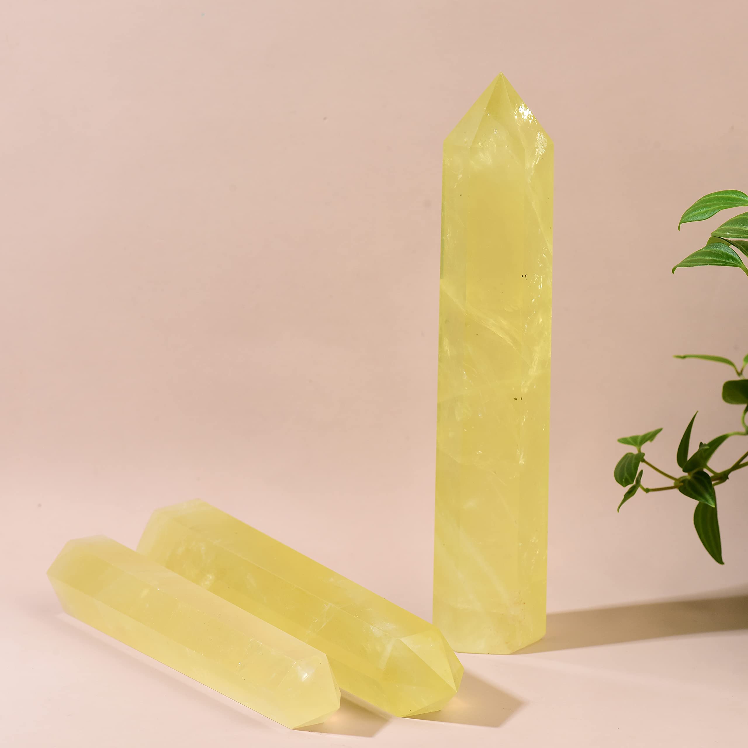 WUYOUSHI natural quartz tower purifies energy while adding tasteful shelf decor.