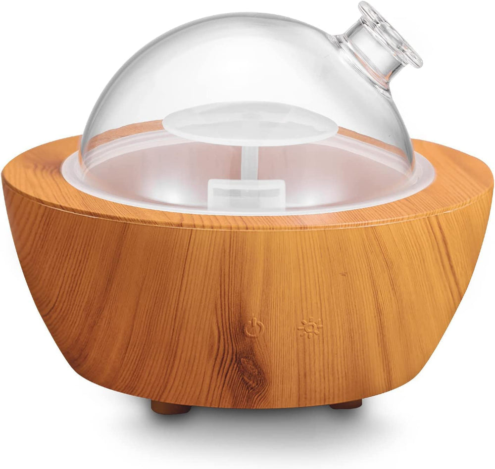 XANAPHIA 280ml glass diffuser with wood grain base in a stylish living room setting for ambient aroma