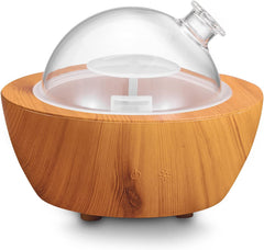 XANAPHIA 280ml glass diffuser with wood grain base in a stylish living room setting for ambient aroma