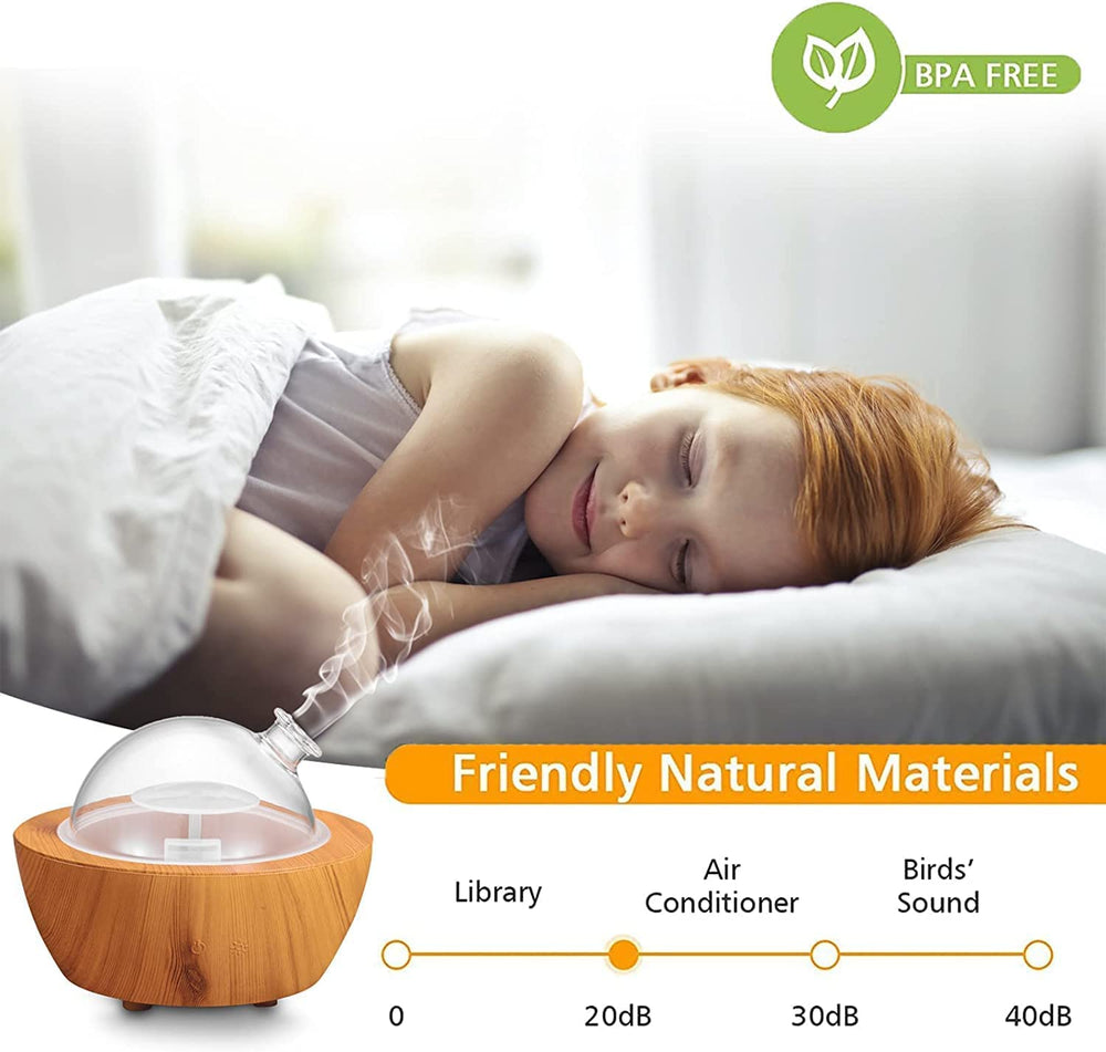 XANAPHIA ultrasonic cool mist diffuser in a bedroom with soft lighting
