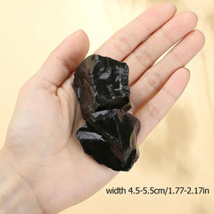 XIANNVXI Obsidian rough texture highlights earthy tones ideal for meditation spaces.