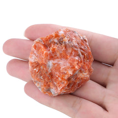 XIANNVXI Sunstone raw crystal close-up highlights natural patterns for decor and ambience.