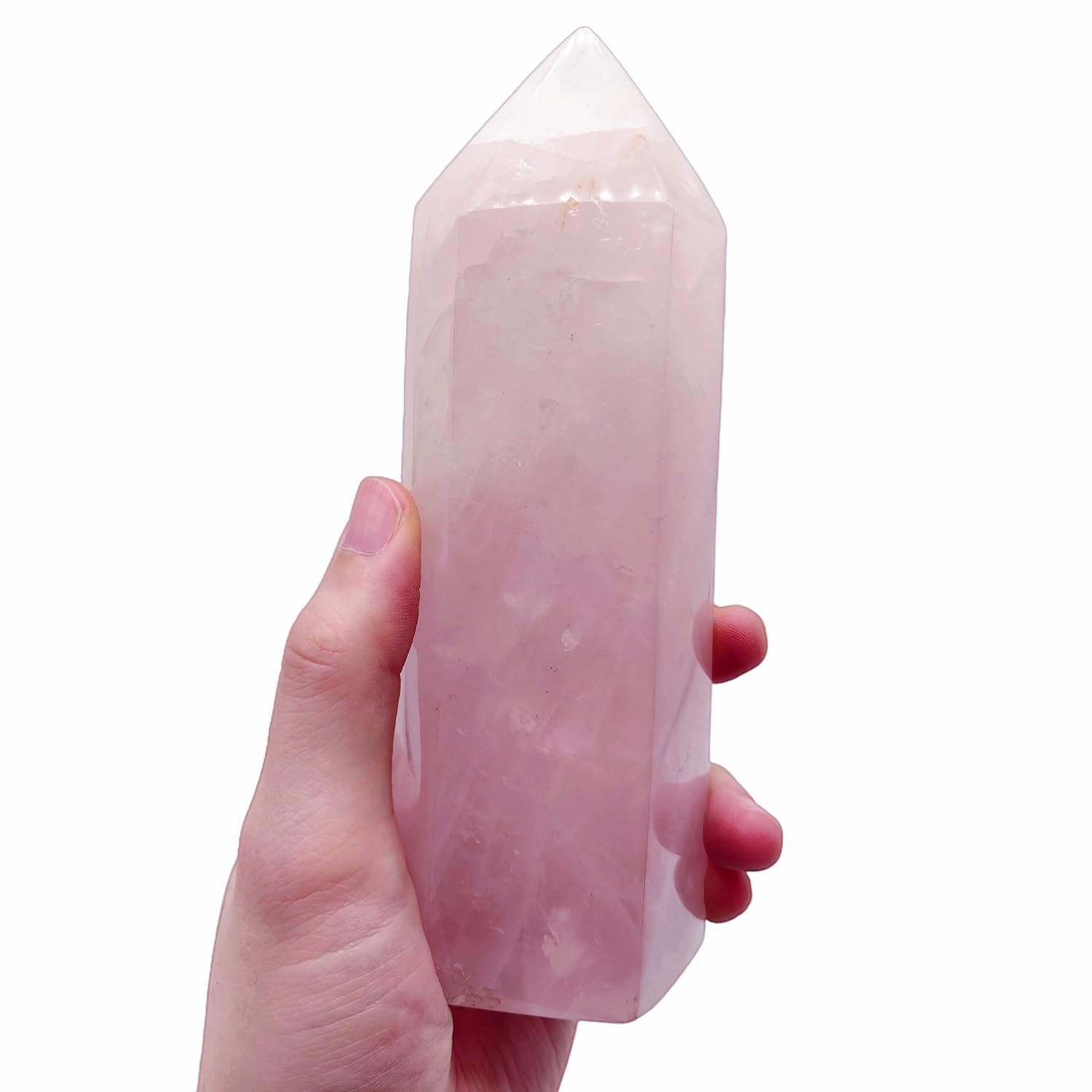 XMHOME rose quartz tower sideview ideal as a calming decor accent on a coffee table