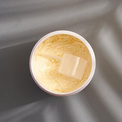 Glass with Pina Colada drink shows Complete Collagen integration into daily routine.