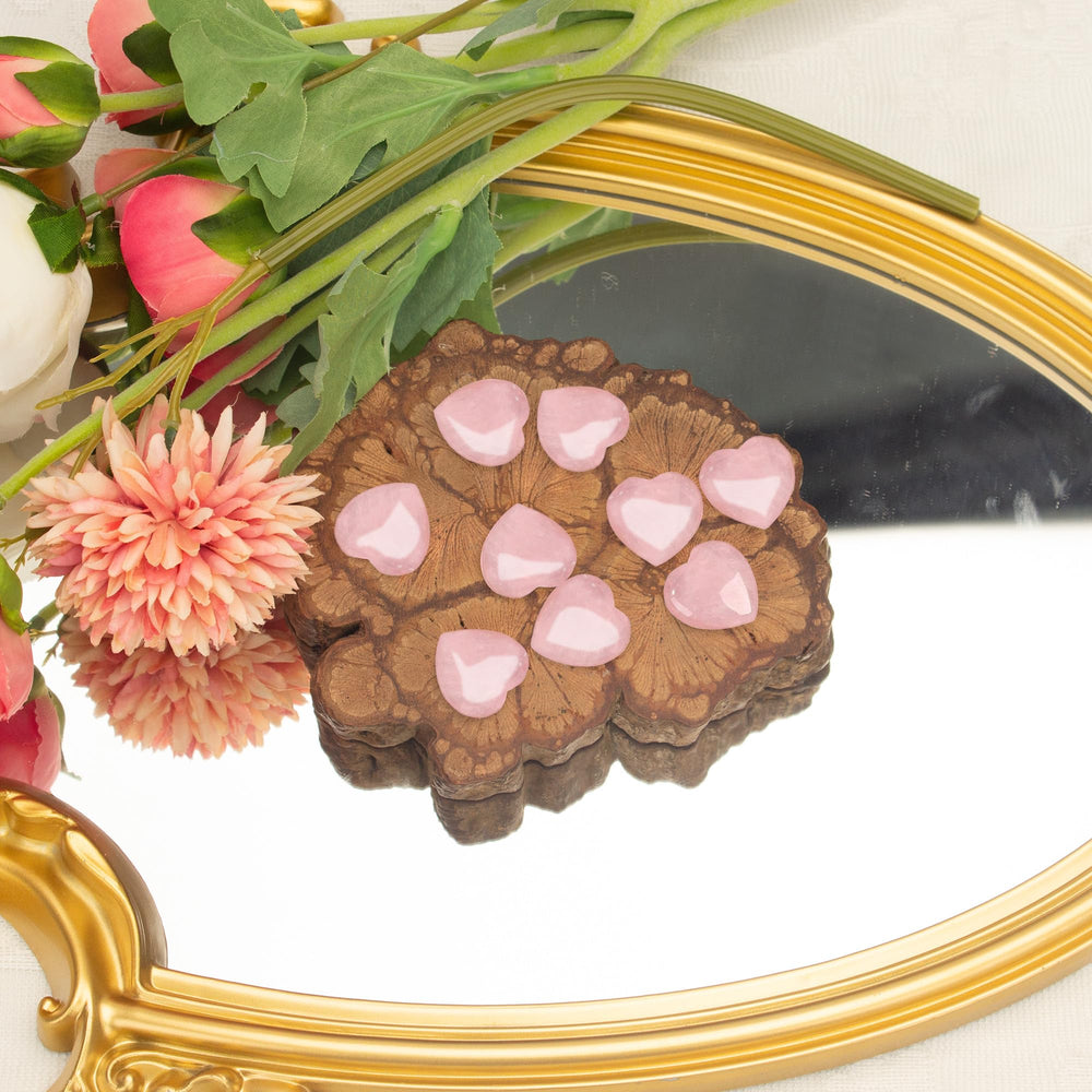 Xyntara rose quartz worry stones with smooth texture to ease daily stress.