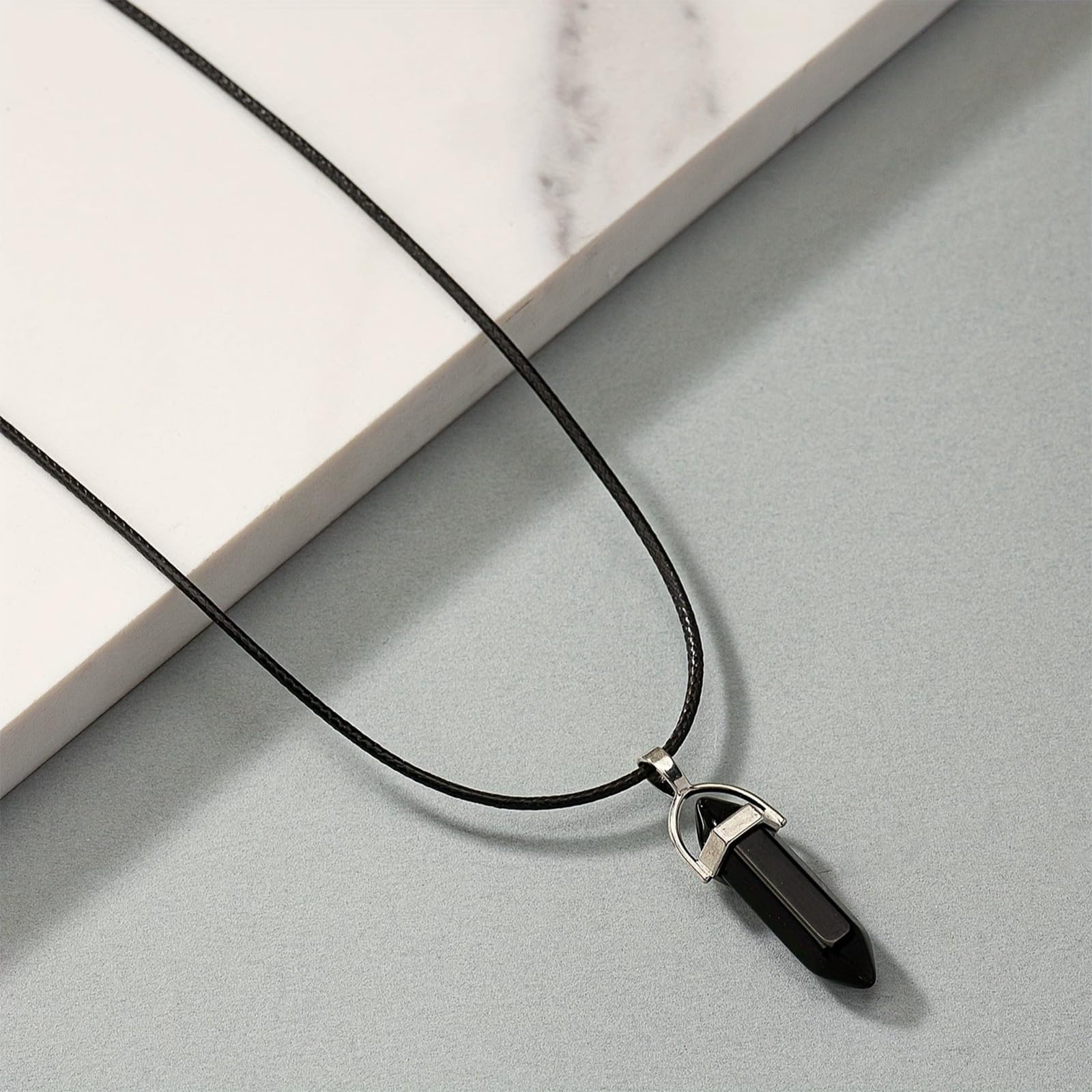 YANCHUN bracelet in hand presents wearable reminder of goals and ambition.