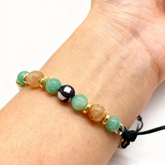 YANCHUN money bracelet crystal detail highlights subtle sparkle and protective symbolism.