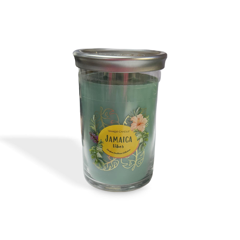 Yankee Candle Jamaica Vibes tumbler with tropical palm and patchouli aroma for relaxing spaces.