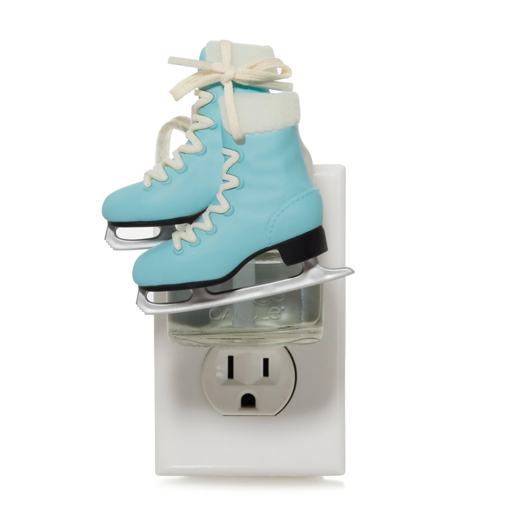 Yankee Candle ScentPlug Diffuser with Ice Skates shows easy refill compatibility for lasting fragrance.