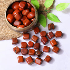 YATHABHISA red jasper stones on an altar for calming chakra energy