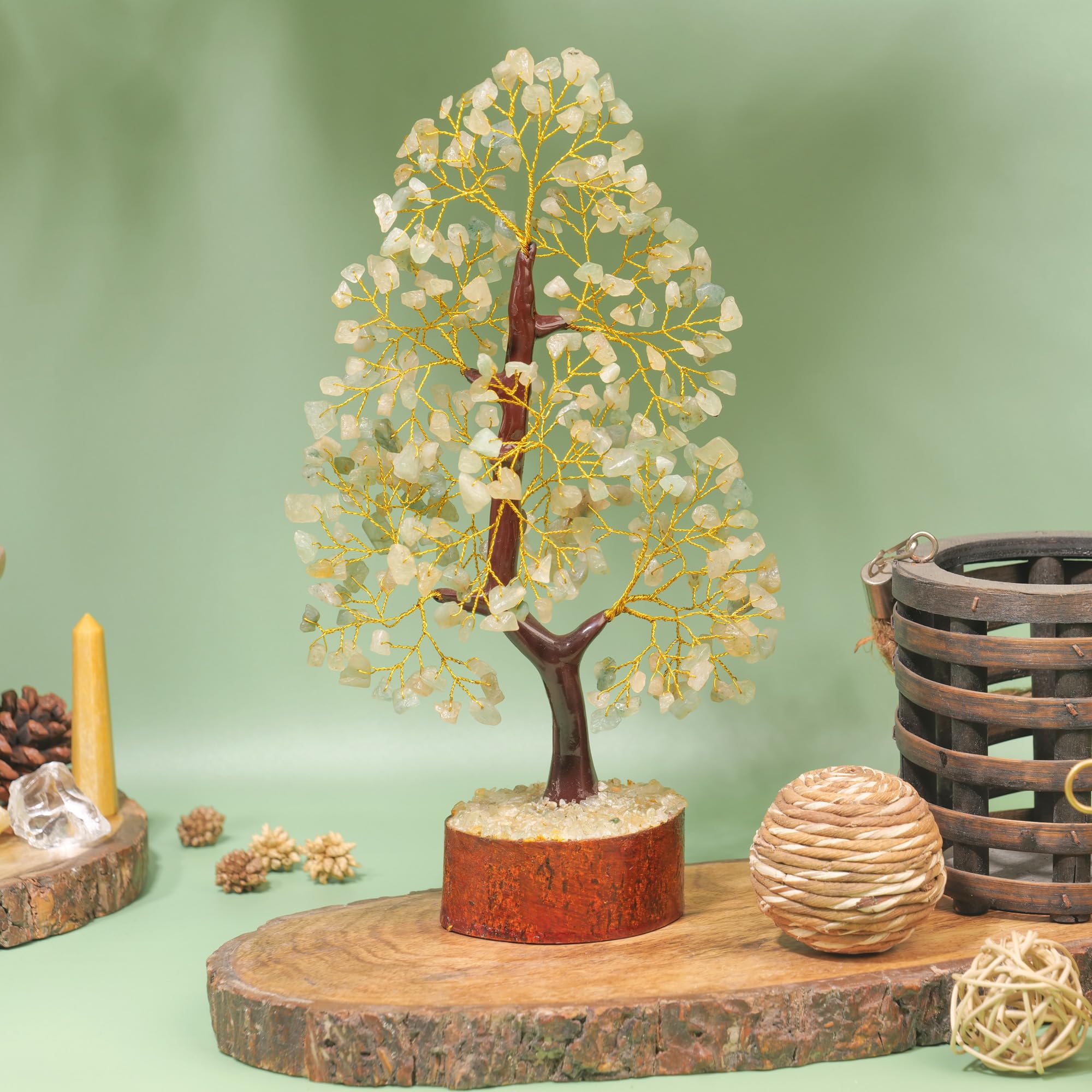 YATHABHISA Green Jade branches and golden wires create a warm focal point for living spaces