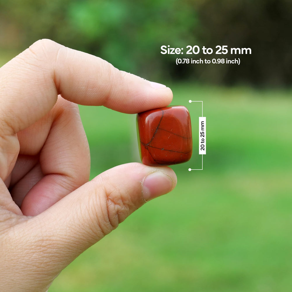 YATHABHISA red jasper stones by fountain for natural energy flow