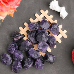 YATOJUZI Amethyst wire-wrapped stones showcasing natural purple hues for unique jewelry.
