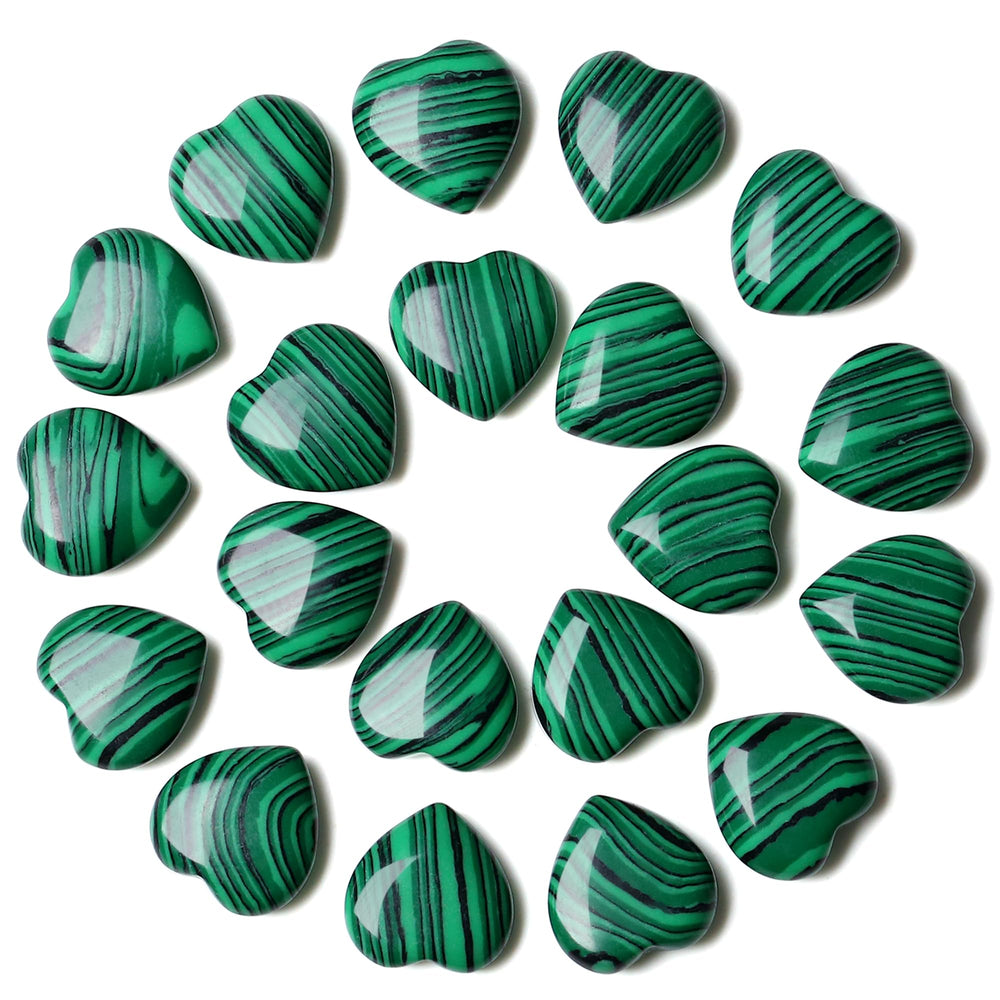 YATOJUZI malachite heart closeup highlighting rich green bands for emotional balance.