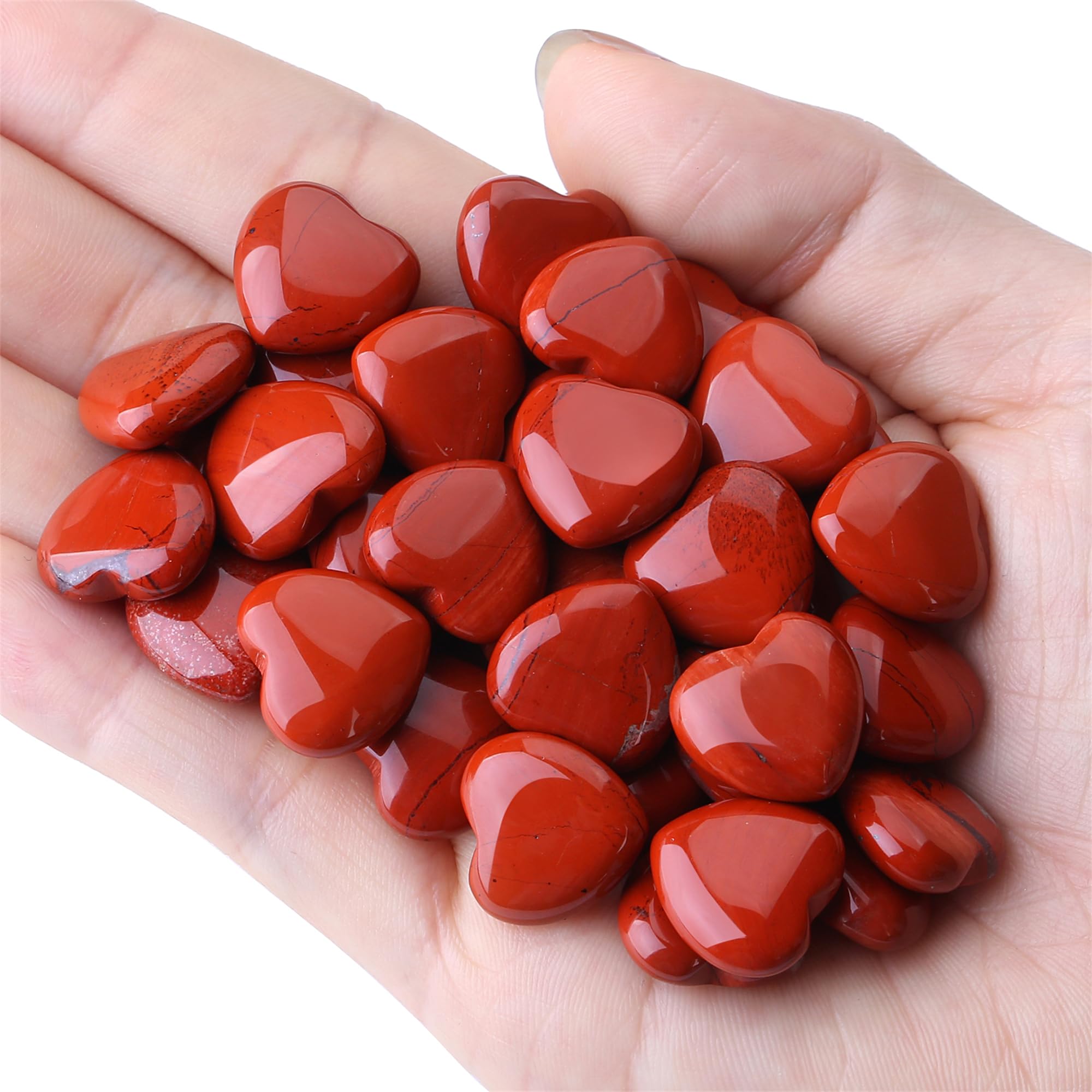 YATOJUZI Red Jasper heart carried in pocket for daily mindfulness.