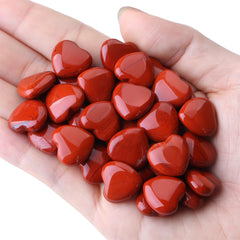 YATOJUZI Red Jasper heart carried in pocket for daily mindfulness.