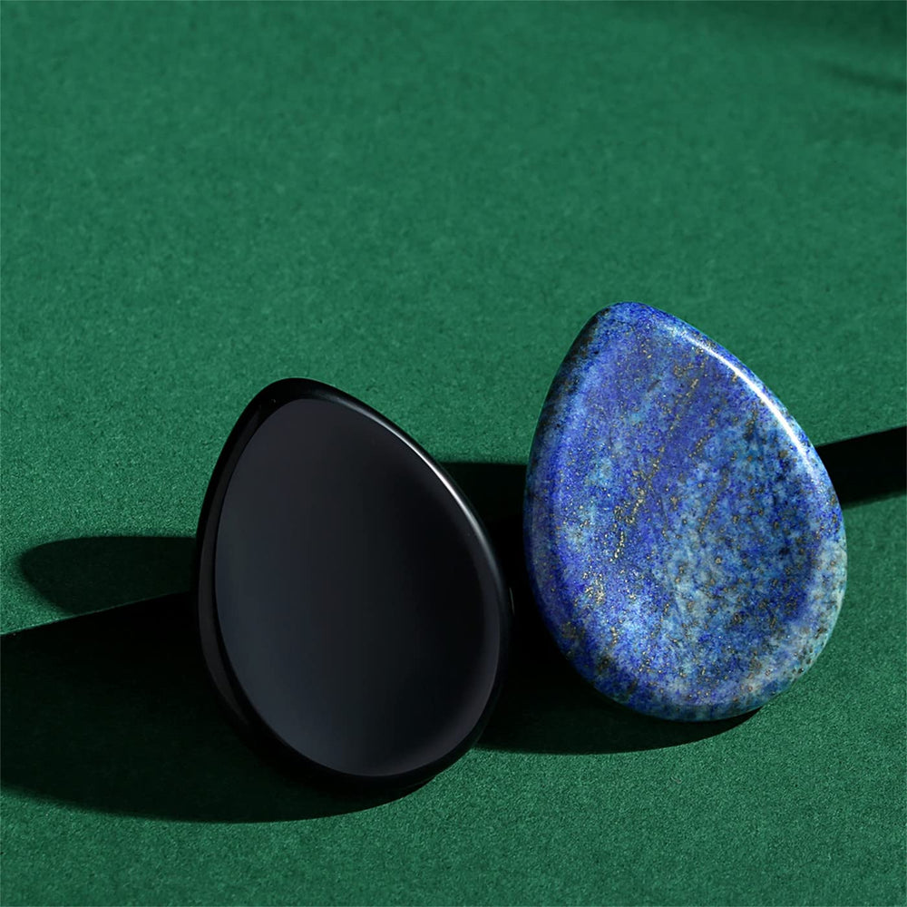 YATOJUZI thumb worry stone in obsidian supports peaceful sleep and shielding negative energy.