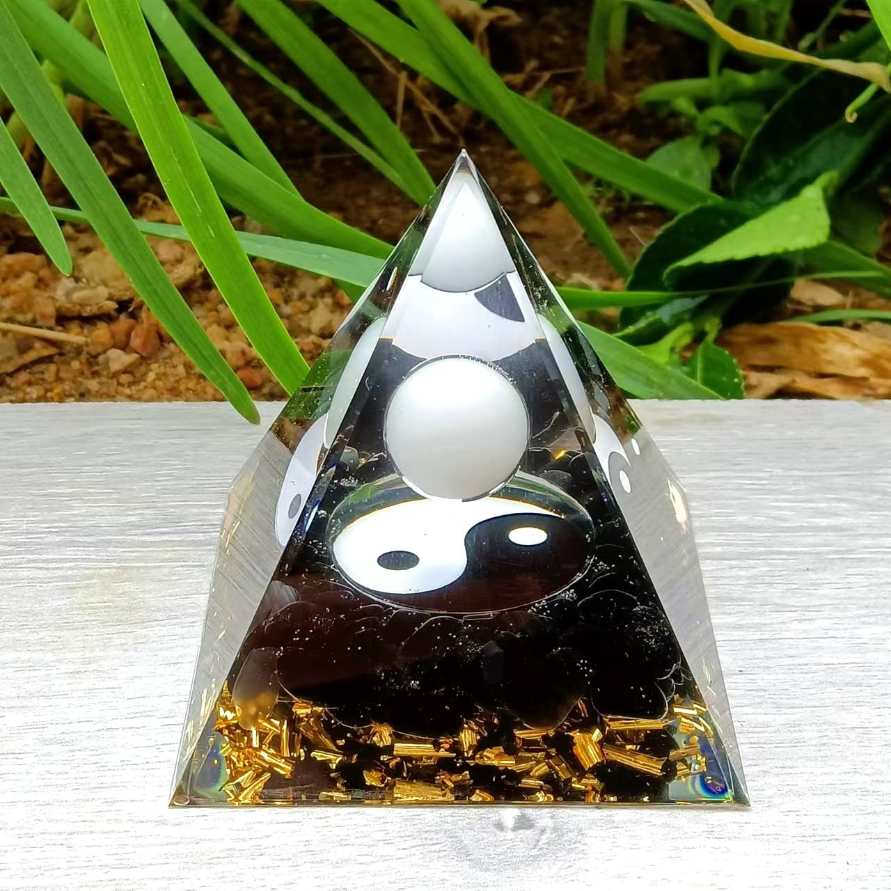 Ycyingcheng Moonstone Orgone Pyramid closeup highlights crystal details and energy focus.
