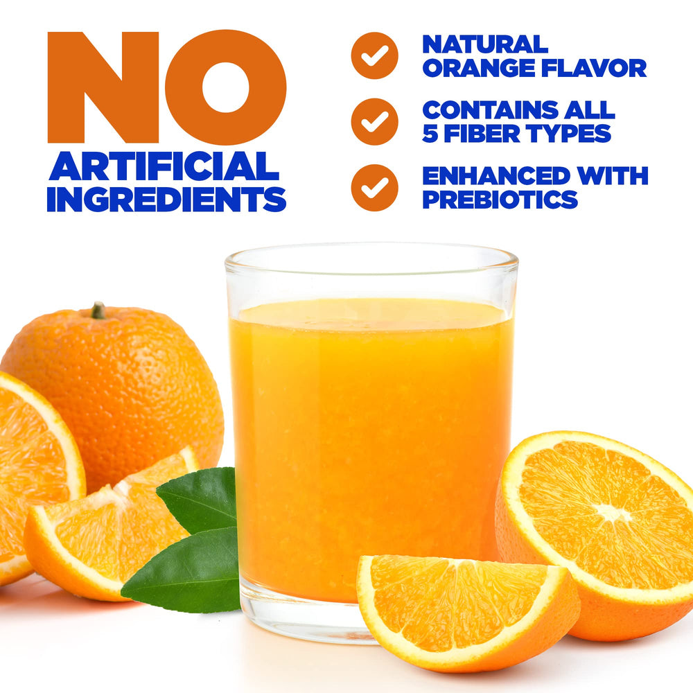 Pouring Yerba Prima Orange Daily Fiber into liquid for easy mixing.