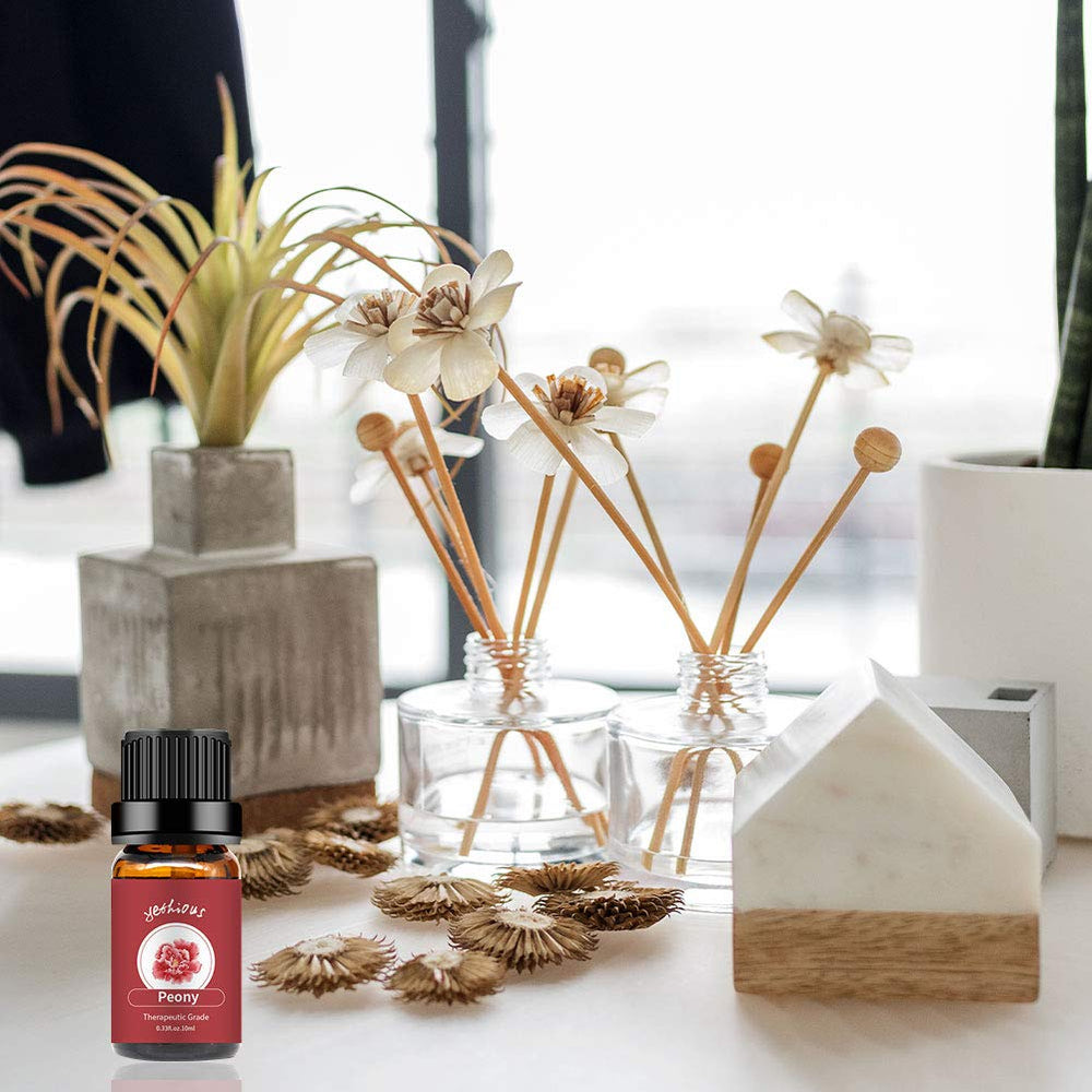 Yethious Peony oil bottle closeup highlighting purity and golden color.