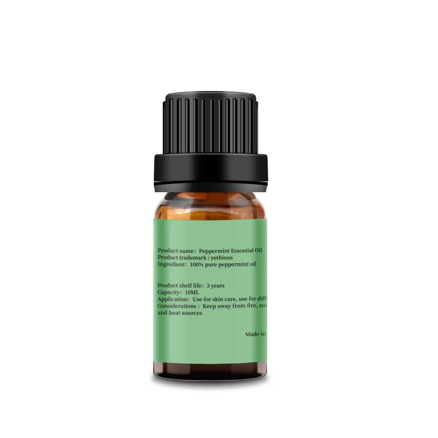 Close-up of Yethious peppermint oil amber glass bottle ready for use