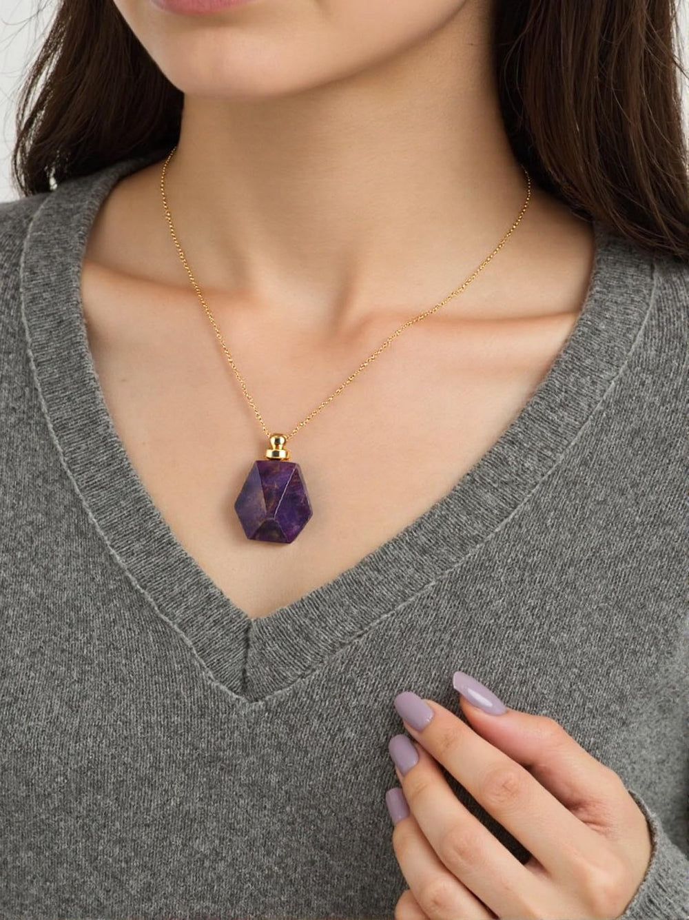 YGLINE Amethyst pendant worn elegantly, highlighting the diffuser jewelry design.
