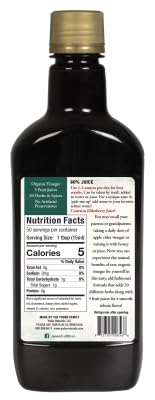 Yoder Naturals pouring ACV into a glass for daily energy and focus